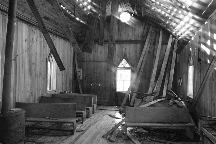 Pews are seen inside an abandoned church near Vernon. 