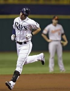 J.J. Hardy of the Baltimore Orioles rounds the bases after he hit