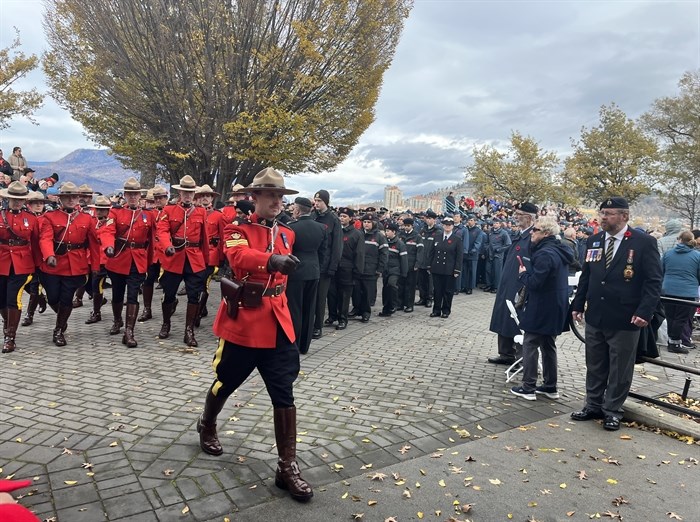 Mounties starting their march to the Queensway traffic circle after the ceremony.