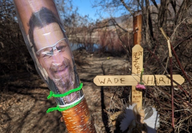 A memorial for Wade Hart stands near the site of an encampment fire that was doused on Jan. 20, 2024.
