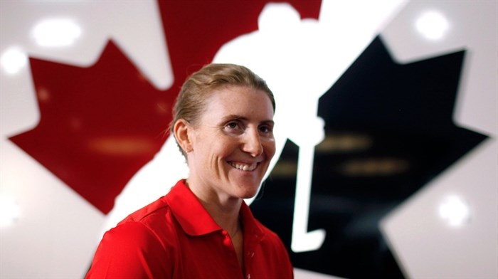 Canadian National Women's hockey player Hayley Wickenheiser at a news conference in Calgary, Monday, May 27, 2013.