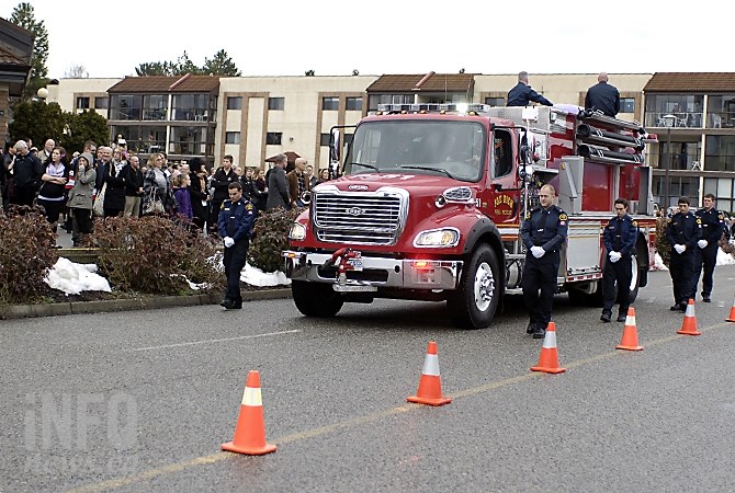 The body of Alexandra Nyuli is taken down Hwy. 33 on the top of a Joe Rich Fire Rescue truck Saturday, Feb. 7, 2015.