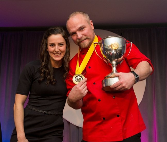Kelowna Olympic silver medalist in freestyle skiing Kelsey Serwa, left, is pictured with 2015 Canadian Culinary Champion chef Ryan O’Flynn from Edmonton following the grand finale event at the Delta Grand Okanagan in Kelowna, Saturday, Feb. 7, 2015.