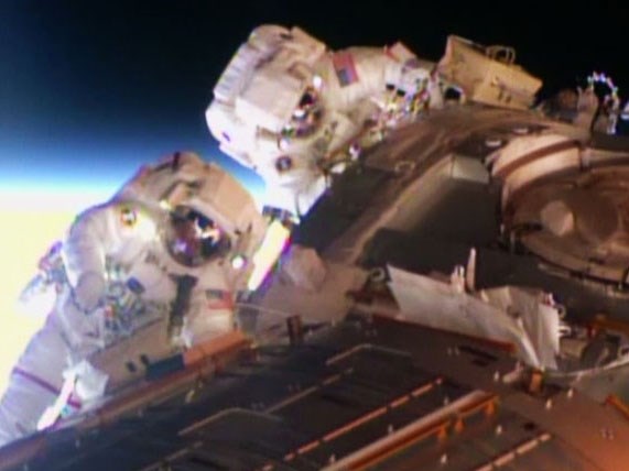 Spacewalkers Barry Wilmore and Terry Virts worked to set up 340 feet of cable on Pressurized Mating Adapter-2 readying it for an International Docking Adapter to accommodate future commercial crew vehicles, Saturday, Feb. 21, 2015