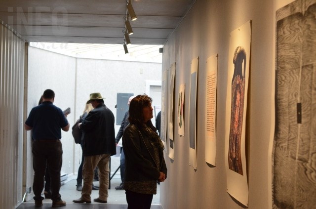 A variety of print works are hung inside the BigSteelBoxes at the corner of 31 Street and 31 Avenue. 