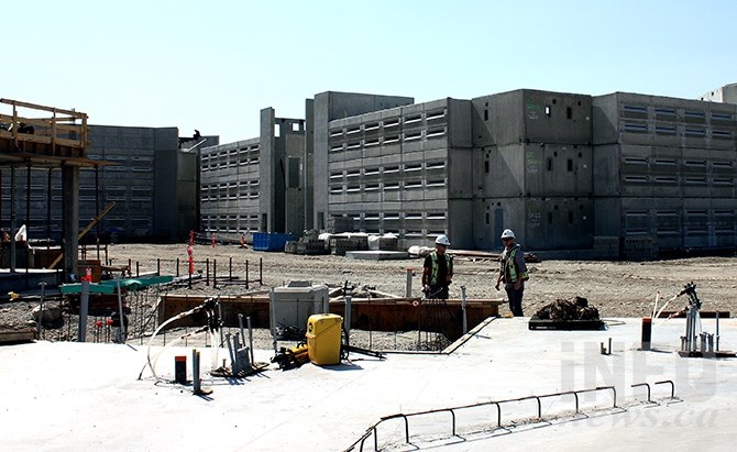 A view of the prisoners' cell pods with the slab for the correctional centre's administrative building in the foreground.