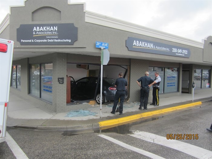 A vehicle crashed into a business in downtown Vernon Tuesday, May 26, 2015.
