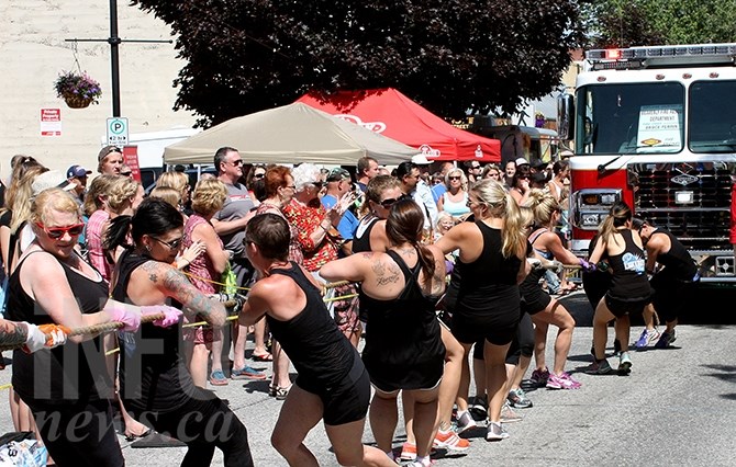 The media team pulls their way to a win against Penticton Auxilary during Saturday's fire truck pull.
