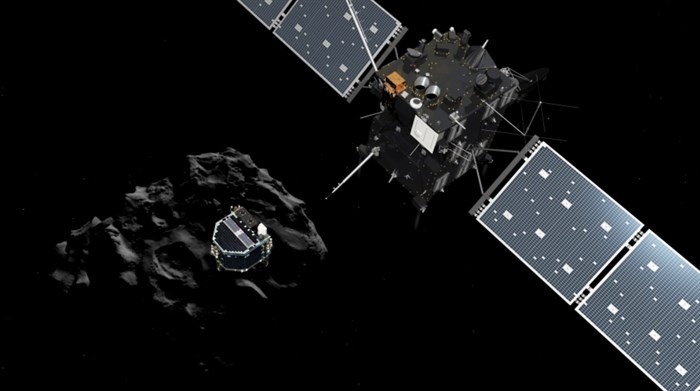 The image released by the European Space Agency ESA on Nov. 12, 2014 shows an artist's rendering depicting lander Philae separating from the Rosetta mother spaceship and descending to the surface of comet 67P/Churyumov-Gerasimenko.