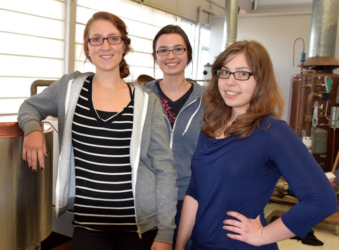 Students Katiana Pyper, Robyn McArthur and Corrie Belanger, left to right, will spend the summer working as part of Dr. Van Hamme’s research team.