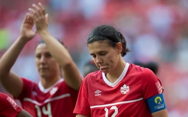 Canada's Christine Sinclair reacts to her teams 2-1 lose to England following the second half of FIFA World Cup quarter-final soccer in Vancouver, B.C. Saturday, June, 27, 2015.
