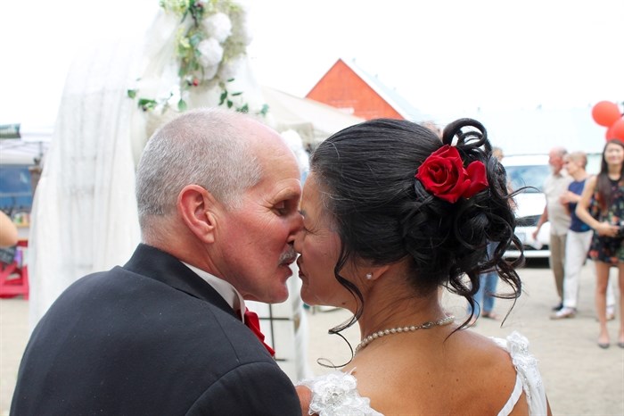 Kalvin Krause and Joan Jong got married at the Armstrong Farmers Market July 18, 2015. 