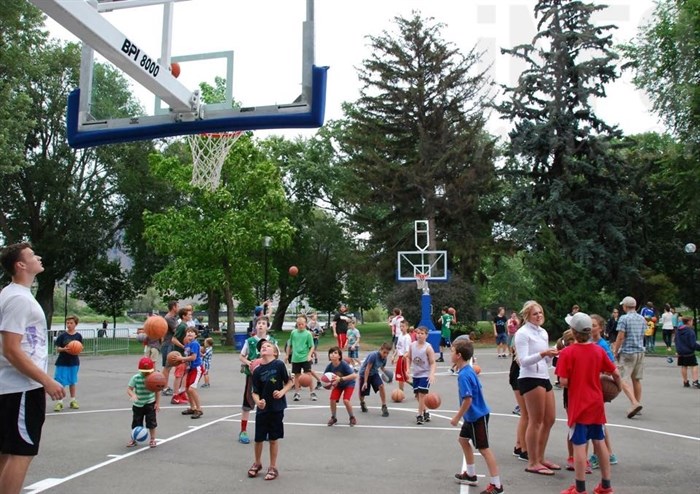 About 100 kids showed up to shoot hoops with Boston Celtic centre and Kamloops native Kelly Olynyk at Riverside Park, Friday, July 24, 2015.