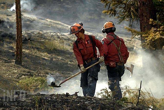 Crews work to contain the Westside Road wildfire Wednesday, July 23, 2015. The fire remains one of two fires of note in the Kamloops Fire Centre a week later.