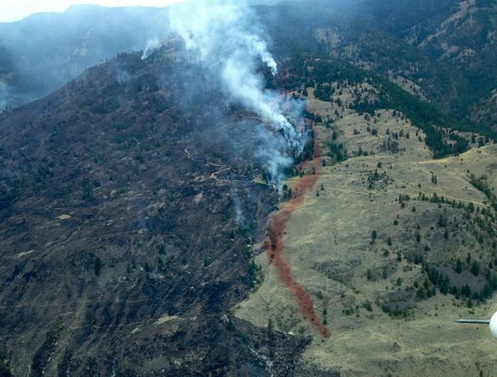 The Testalinden Creek fire is seen in this aerial photo on Saturday, Aug. 16, 2015 contributed by the B.C. Wildfire Service.