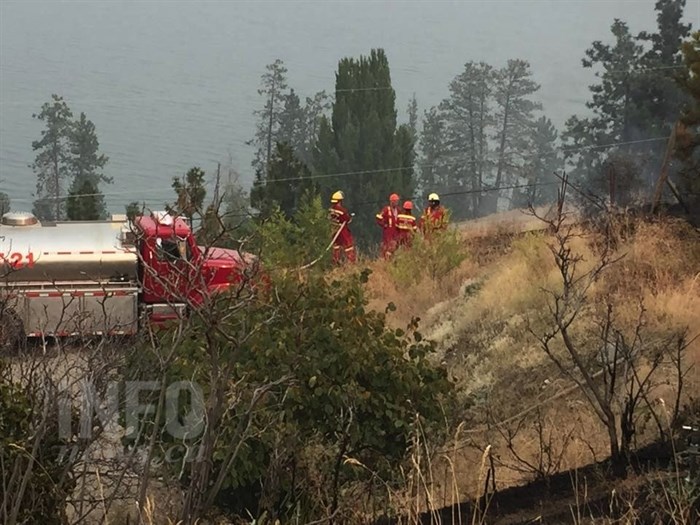 A Peachland Fire Department water tender was used to fight a grass fire in the city, Monday, Aug. 24, 2015.