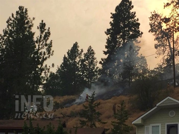 Fire crews are fighting a fire in Peachland this afternoon, Monday, Aug. 24, 2015.