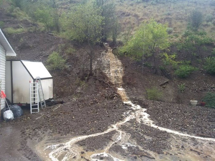The mudslide behind Tokla and Bob's home after a flash flood earlier this summer. 