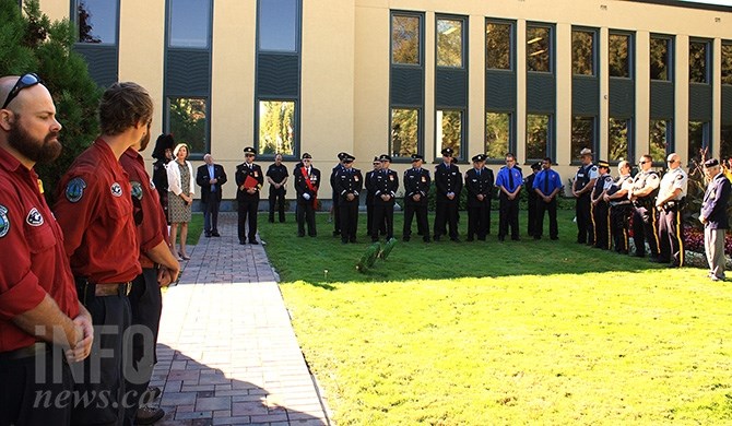 Penticton's emergency service personnel and Armed Forces veterans gather on Friday, Sept.11, 2015 to pay tribute to fallen members and commemorate the anniversary of the 9/11 terrorist attack on the World Trade Centre in Penticton's Veteran's Park.