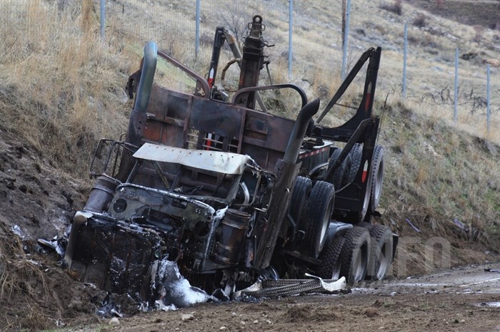 An empty logging truck and a sedan collided head-on south of Okanagan Falls on Highway 97, Sunday, Jan. 24, 2016.