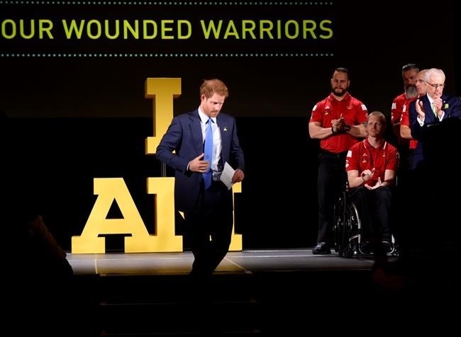 Prince Harry receives applause as he walks off the stage after delivering a speech to assembled guests during a ceremony to promote the 2017 Invictus Games, which the city will be hosting, in Toronto on Monday, May 2, 2016. 