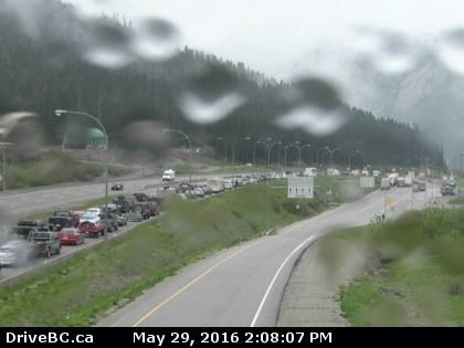 Backed up traffic on Highway 5 southbound can be seen in this image from the Drive B.C. webcam at the Zopkios Rest Area near the Coquihalla Summit, Sunday, May 29, 2016.