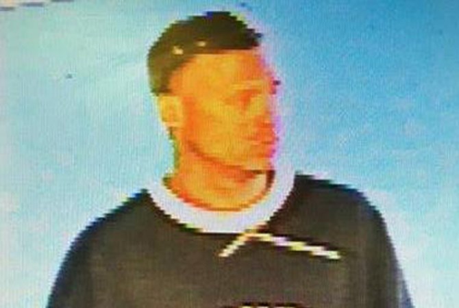 Police are looking to speak with this man in connection to a theft at the Dilworth liquor store.