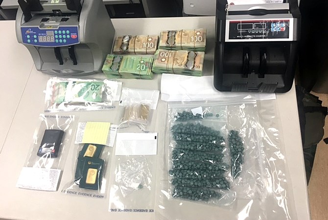 RCMP seized fentanyl, cash and production equipment from a West Kelowna warehouse March 3, 2016.