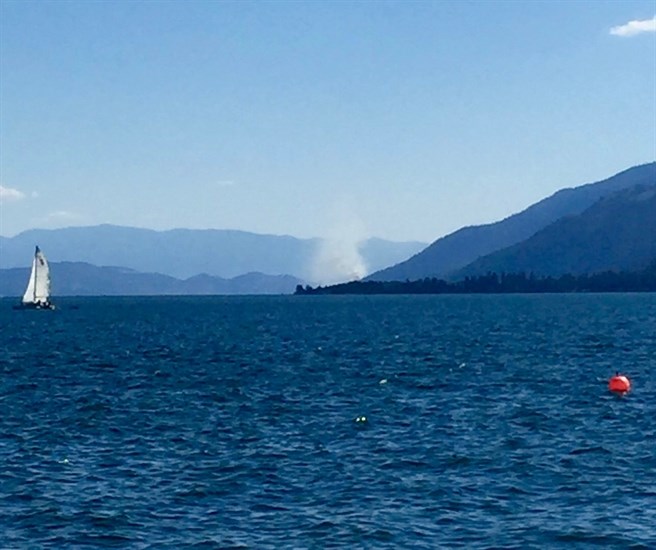 A fire is burning north of Lake Okanagan Resort on the west side of Okanagan Lake, Wednesday, Aug. 17, 2017.