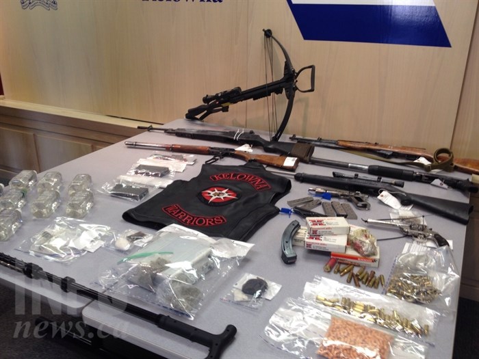 Police displayed guns and drugs confiscated from a West Kelowna home during a press conference July 13, 2016. Tyson Bone, Savanna Malone and one other man were arrested for possession for the purpose of trafficking and firearm offences.