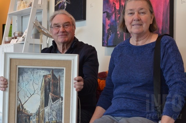 Darrell and Audrey Cliffe, from Armstrong, were pleasantly surprised at the value of this streetscape painting, at roughly $6,000 to $8,000. 