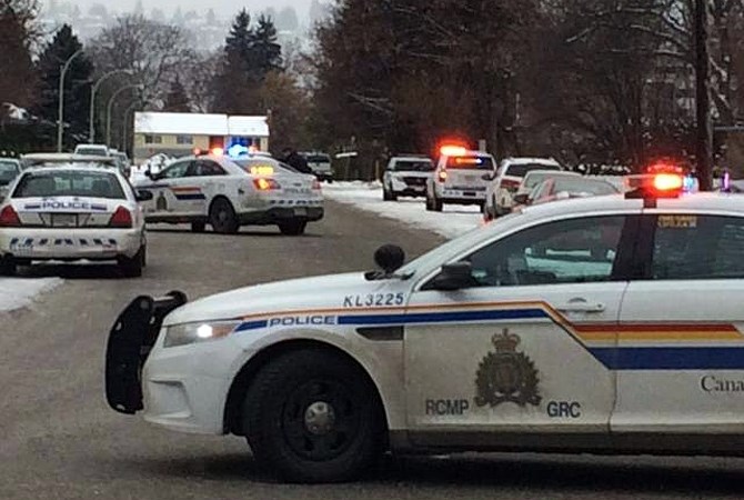 Kelowna RCMP blocked of a portion of Christleton Avenue, Saturday, Dec. 26, 2015 after a targeted home invasion sent one man to hospital.