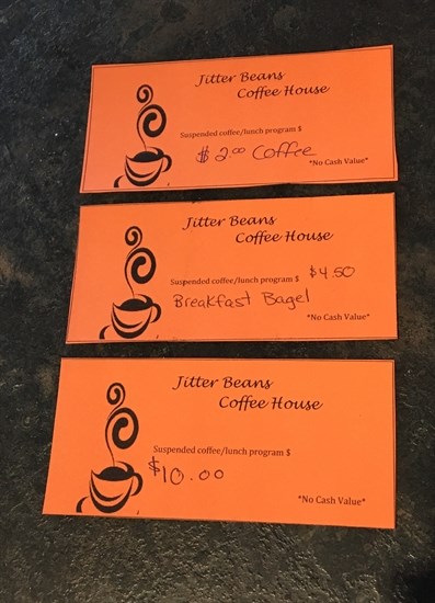 When a customer purchases a suspended coffee, or other item, the cashier records it on a coupon and uses it for someone in need. 