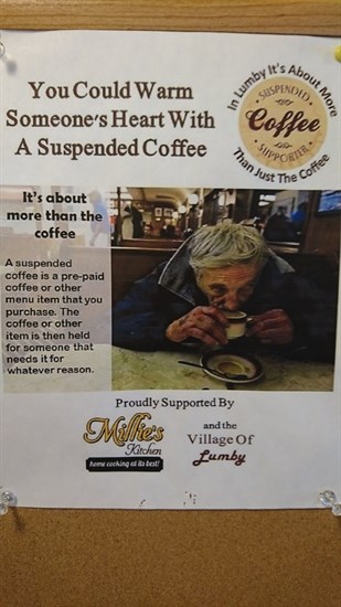 This poster lets customers know about the suspended coffee program. 