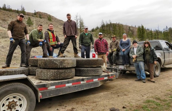 Members of the Kamloops 4x4 Club along with some tires pulled out of the Dewdrop area last year.
