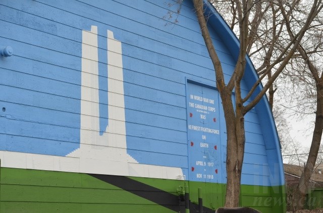 Wylie hopes to create a memorial using four search lights pointed at the sky to mimic the Vimy Ridge monument in France (replicated in this mural). 