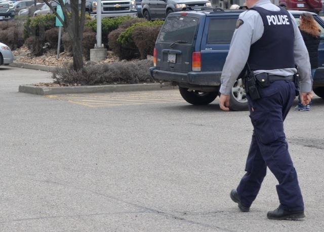 RCMP strip their yellow stripes in protest