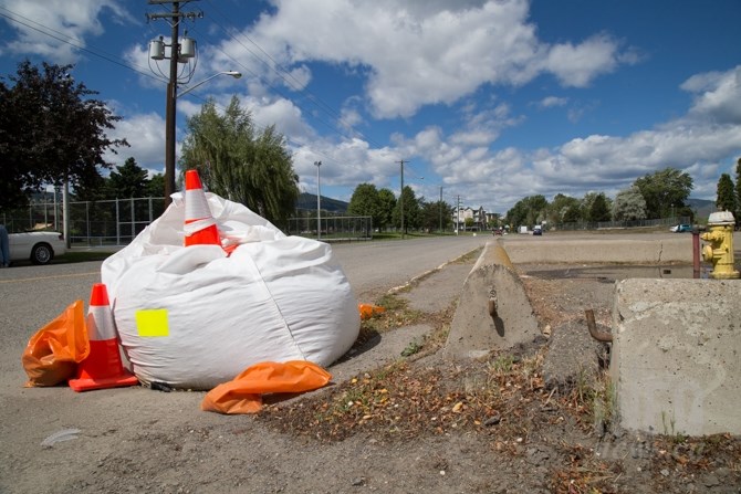 City workers have placed these large bags over storm drains as part of the flood watch procedures.