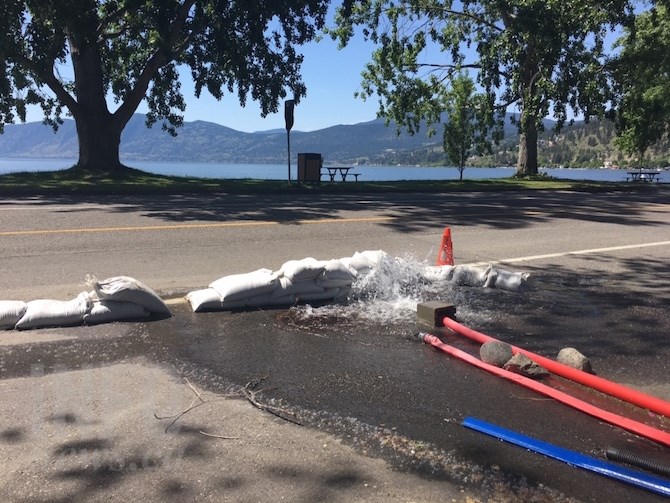 Beach Avenue west of Bliss Bakery in Peachland is closed to accommodate all the hoses pumping the rising ground water out of basements and crawl spaces.