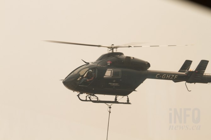 Several helicopters were in operation near the Boston Flats trailer park. 