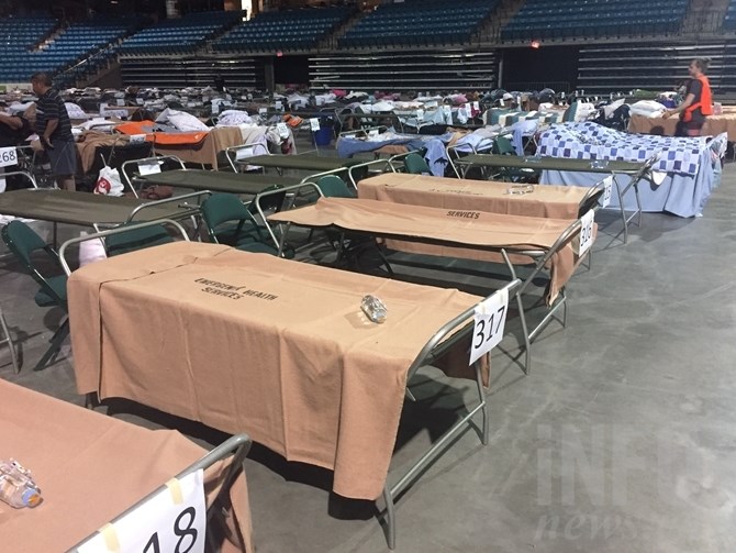 What would normally be the Blazers ice surface is still home to hundreds of evacuee cots.