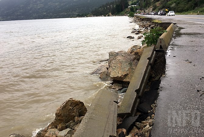 FILE PHOTO: A portion of Highway 97 near Peachland was almost closed during a windstorm in June that toppled concrete barricades.