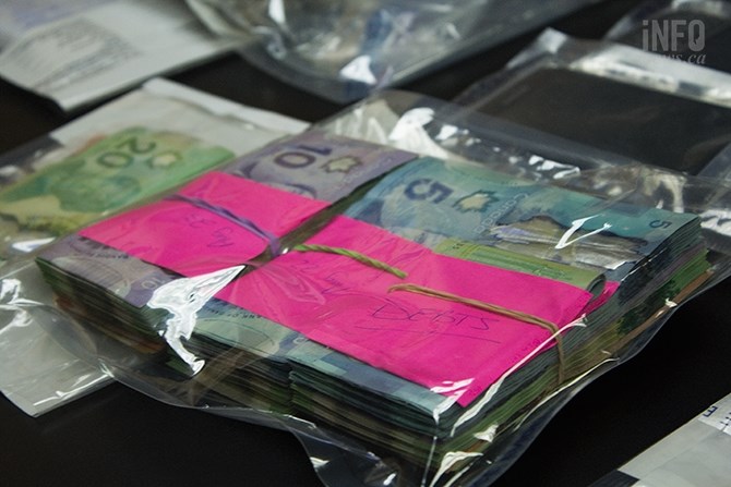 More than $18,000 cash was seized during a drug bust in Kamloops last month. RCMP say the street-level operation was earning about $5,000 per day.