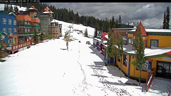 Snow can be seen on the village webcam at Silver Star Mountain Resort, Monday, June. 11, 2018.