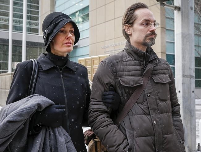 Jennifer and Jeromie Clark, leave a sentencing hearing after to couple were found guilty of criminal negligence causing the death of their 14-month-old son in 2013, outside the courts centre in Calgary, Friday, Feb. 8, 2019. 