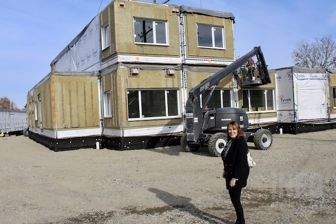 Dawn Himer, Executive Director of the John Howard Society, went to watch the the first modular units being put in place for the McIntosh supportive housing project in October. It's expected to be open by the end of March to provide housing for those who will soon move into the Fuller 