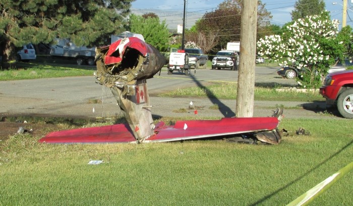 On May 18, a day after the crash, the tail end of the fallen Snowbird was still on Glenview Avenue.