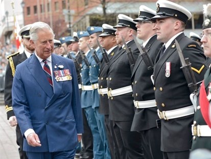 Prince Charles inspects honour guards in Halifax on Monday, May 19, 2014.