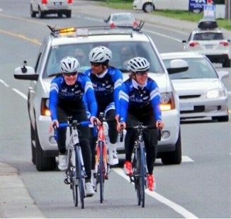 Clara Hughes, far left, travels from Vancouver to Hope during her Clara's Big Ride tour across Canada.