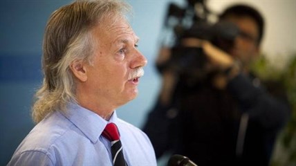British Columbia Teachers' Federation President Jim Iker announces a full-scale strike for school teachers is set for Tuesday, June 17 during a press conference in Vancouver on Thursday June 12, 2014.
